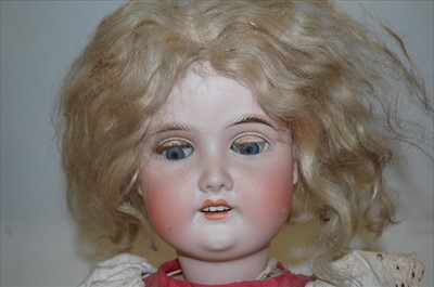 Lot 2095 - A Gebruder Kuhnlelnz bisque head doll, having...