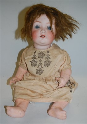 Lot 2104 - A German Heubach bisque head doll, having...