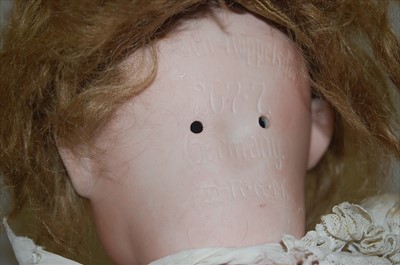 Lot 2106 - An Ernst Heubach Köppelsdorf bisque head doll,...