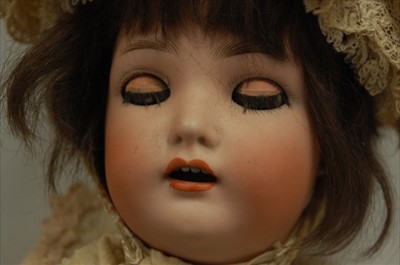Lot 2114 - A Simon & Halbig bisque head doll, having...
