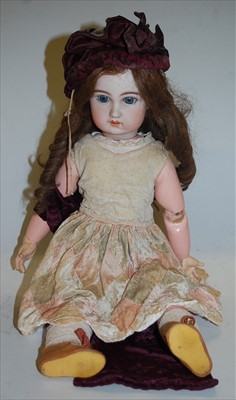 Lot 2126 - A French bisque head doll, unmarked but...