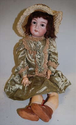 Lot 2134 - A Max Handwerck bisque head doll, having...