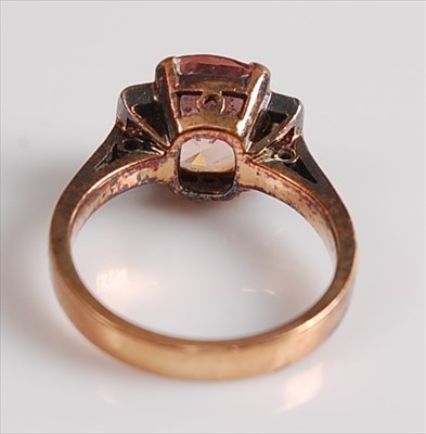 Lot 2129 - A yellow and white metal, pink sapphire and...