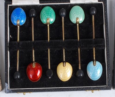Lot 106 - A set of six 1950s silver and enamel coffee...