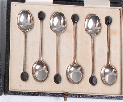 Lot 107 - A set of six 1920s silver coffee bean spoons,...