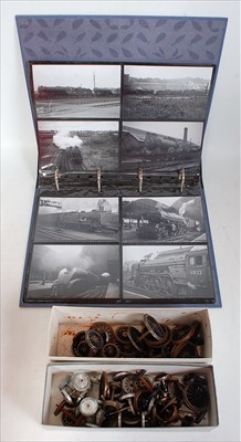 Lot 300 - An album of photographs mainly of steam in...