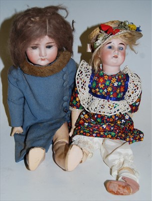 Lot 2162 - A German bisque doll, having rolling blue eyes...