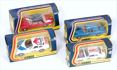 Lot 1660 - Four various window boxed Corgi Toys saloons...