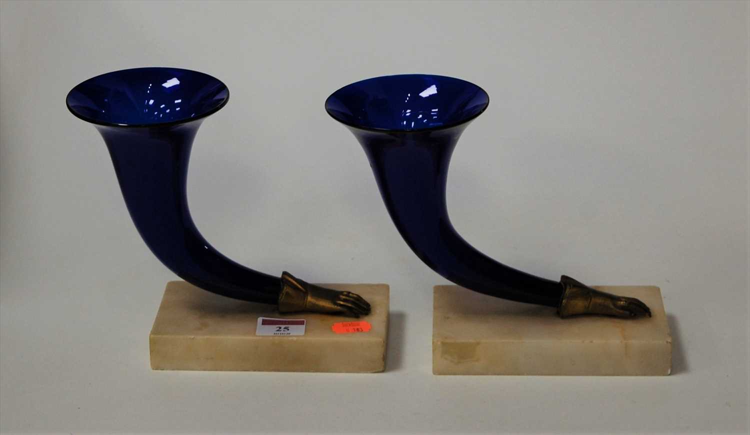 Lot 25 - A pair of blue glass cornucopia vases, on...