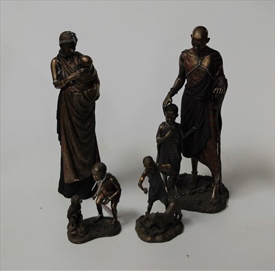 Lot 32 - A collection of four Maasai bronzed...