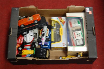 Lot 87 - A box of assorted modern issue diecast toys,...