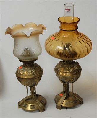 Lot 100 - A pair of Victorian style cast brass lamps,...