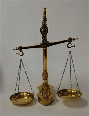 Lot 101 - A brass balance scale, having twin pan trays,...