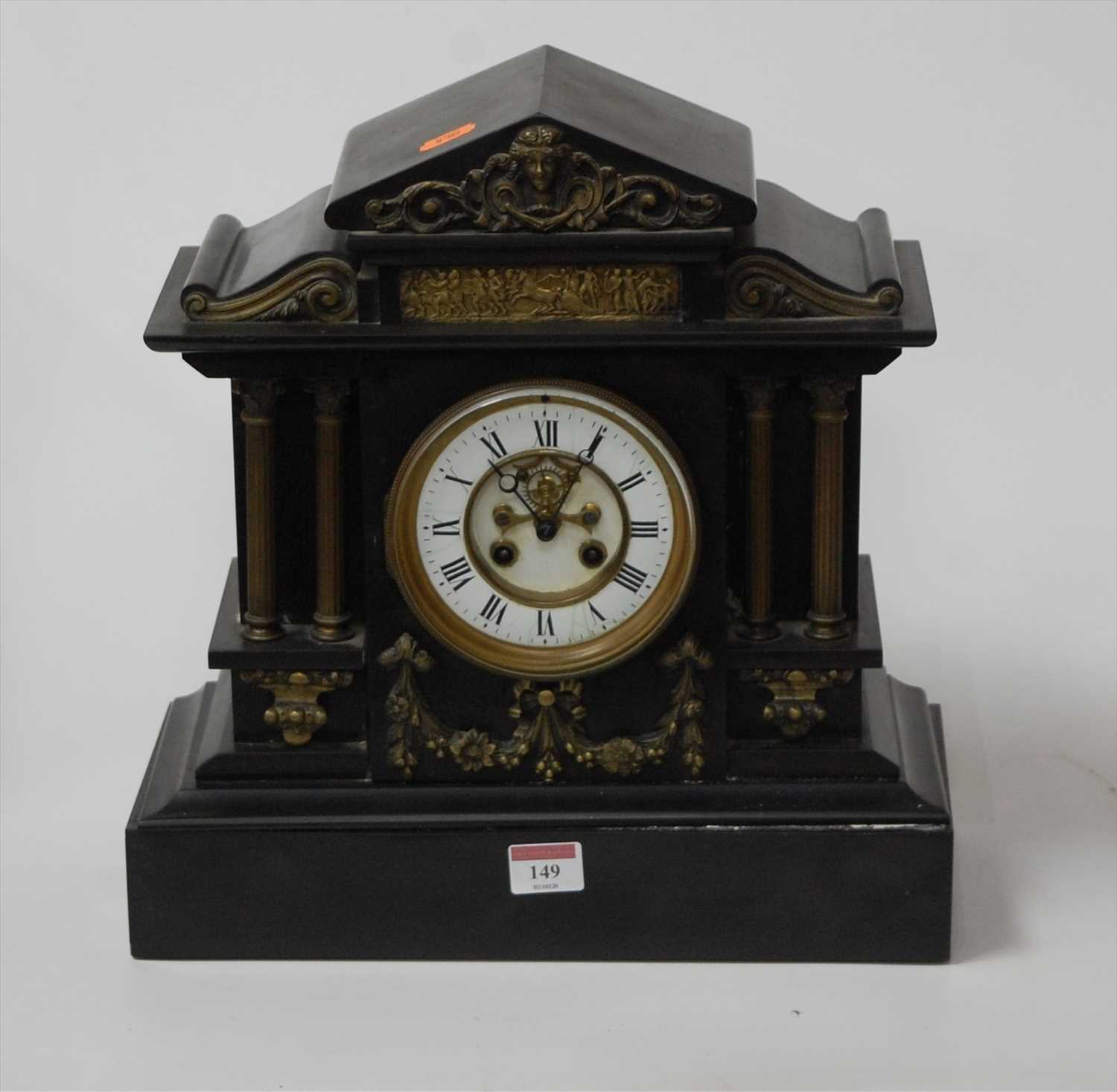 Lot 149 - A Victorian slate mantel clock with brass...