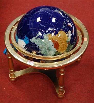 Lot 150 - A modern polished hard stone terrestrial globe...