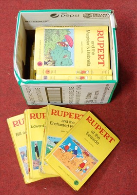 Lot 83 - A box of assorted Rupert volumes, as published...