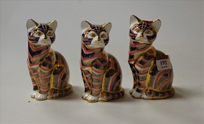 Lot 192 - Three various Royal Crown Derby cat ornaments,...