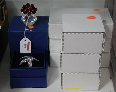 Lot 199 - A collection of boxed Swarovski crystal...