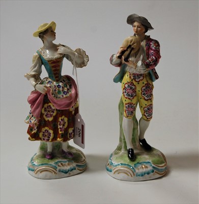 Lot 206 - A pair of continental porcelain figures in the...