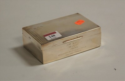 Lot 248 - A silver table cigarette box, having engraved...