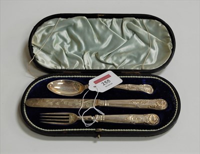 Lot 255 - A cased silver three-piece christening set, in...