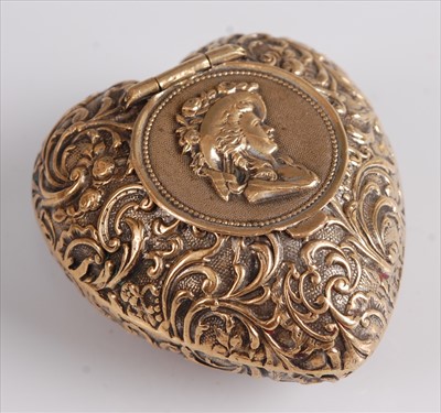 Lot 376 - A continental silver gilt and embossed heart...