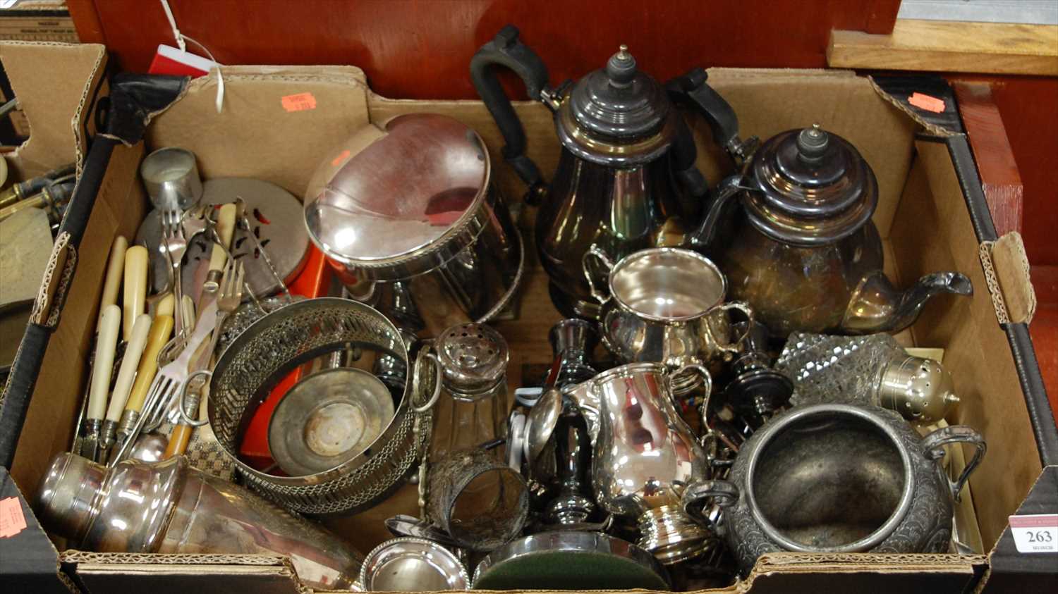 Lot 263 - A box of miscellaneous metalware, to include...