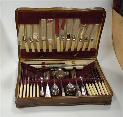 Lot 268 - A 1940s oak cased canteen of silver plated...