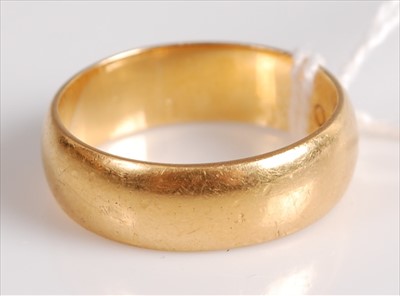 Lot 396 - A 22ct gold wedding band, 7.3g, size N