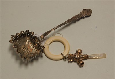 Lot 306 - A filled silver baby's rattle in the form of...