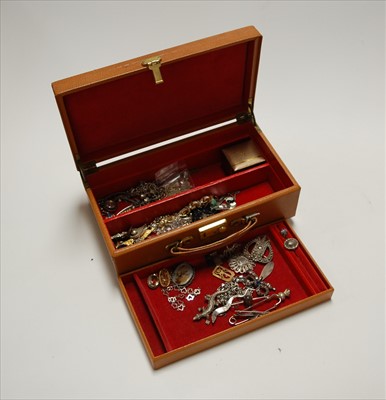 Lot 324 - A leather clad jewellery box and contents, to...