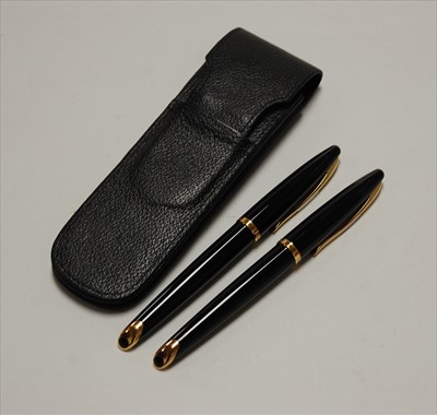 Lot 338 - A Waterman's fountain pen, the black case with...