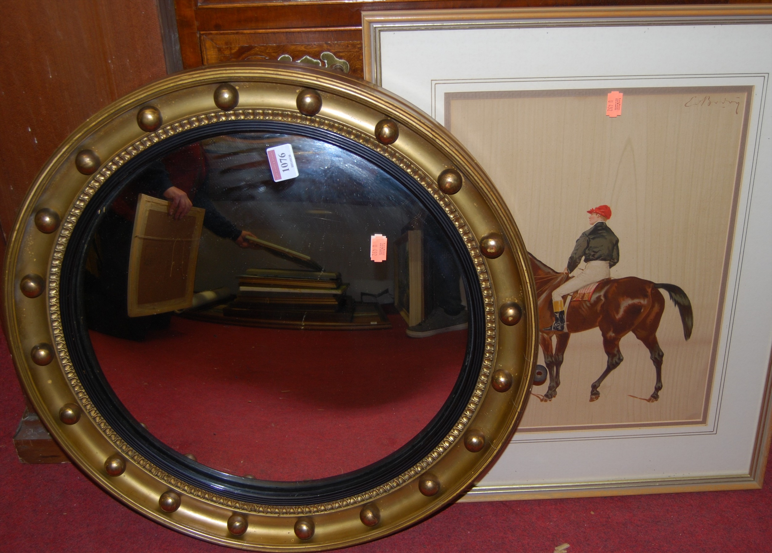 Lot 1076 A Gilt Framed Convex Wall Mirror Having