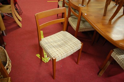 Lot 1314 - Svend Madsen - a 1960s Danish teak dining...