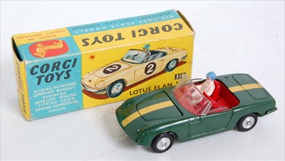 Lot 1673 - A Corgi Toys No. 318 Lotus Elan S2 comprising...