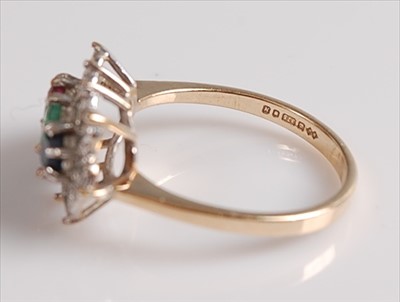 Lot 2133 - A 9ct yellow and white gold, ruby, emerald,...