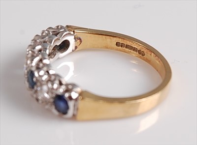 Lot 2141 - An 18ct yellow and white gold, sapphire and...