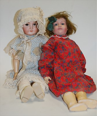 Lot 2170 - A German bisque head doll, having rolling blue...
