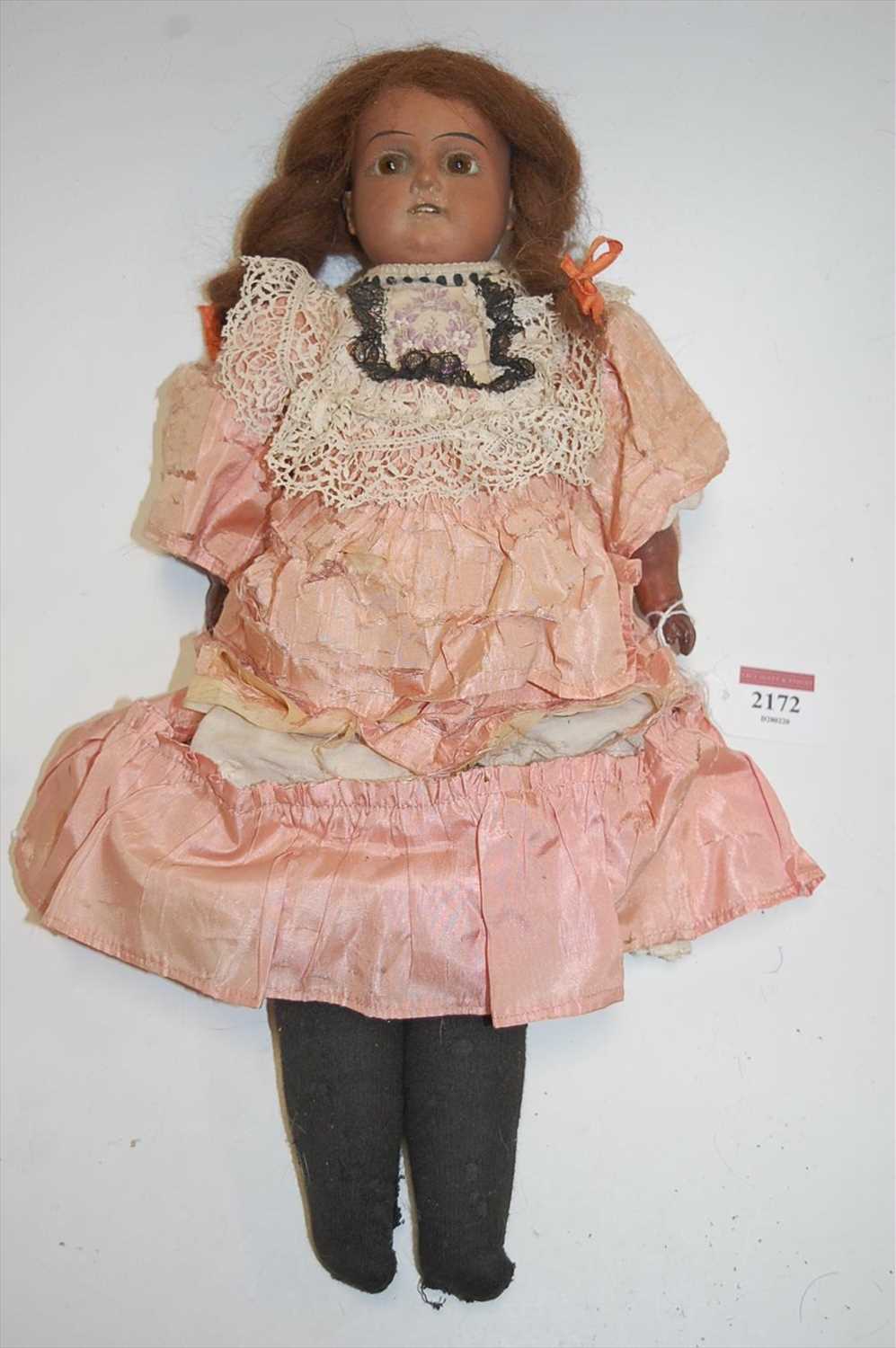 Lot 2172 - An Armand Marseille 'Mulatto' bisque head doll,...