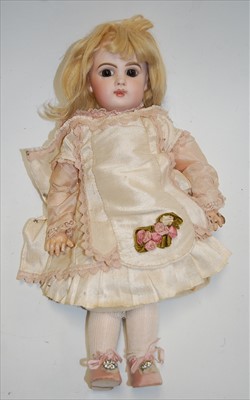 Lot 2174 - A Jumeau(?) bisque head doll, having fixed...
