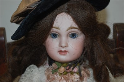Lot 2177 - A Paris Bébé bisque head doll, having fixed...