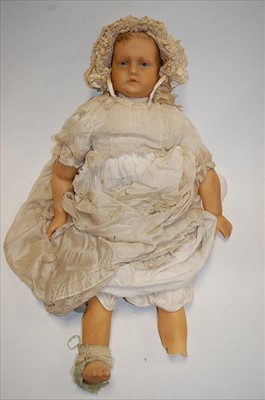 Lot 2183 - An English poured wax doll, having inserted...