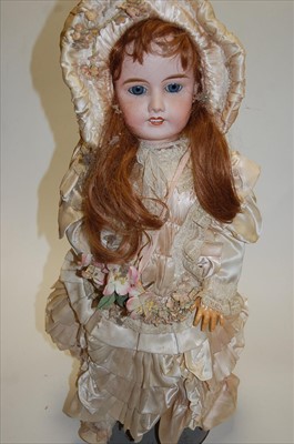 Lot 2186 - A Limoges Paris Chérie bisque head doll,...