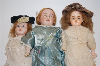 Lot 2195 - An English bisque head doll, having fixed blue...