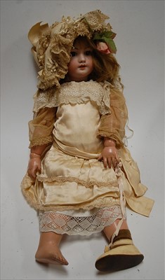 Lot 2200 - A German bisque head doll, possibly Simon &...