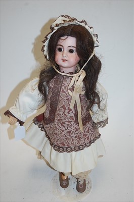 Lot 2206 - A German(?) bisque head doll, having fixed...