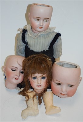 Lot 2226 - A Schoenau & Hoffmeister bisque head doll,...