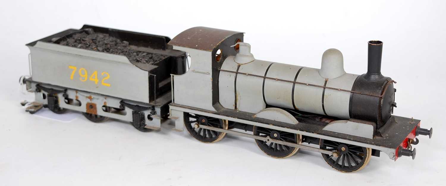 Lot 324 - A brass built locomotive and tender and body,...
