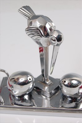 Lot 150 - A novelty chromed metal cruet stand in the...