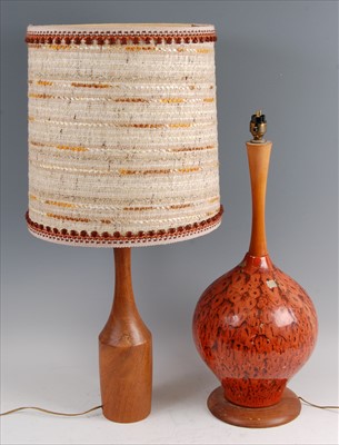 Lot 187 - A 1970s Danish turned teak table lamp, having...